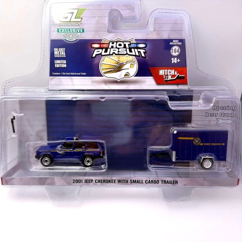 Greenlight Jeep Cherokee 2001 With Small Cargo Trailer 1:64 przód