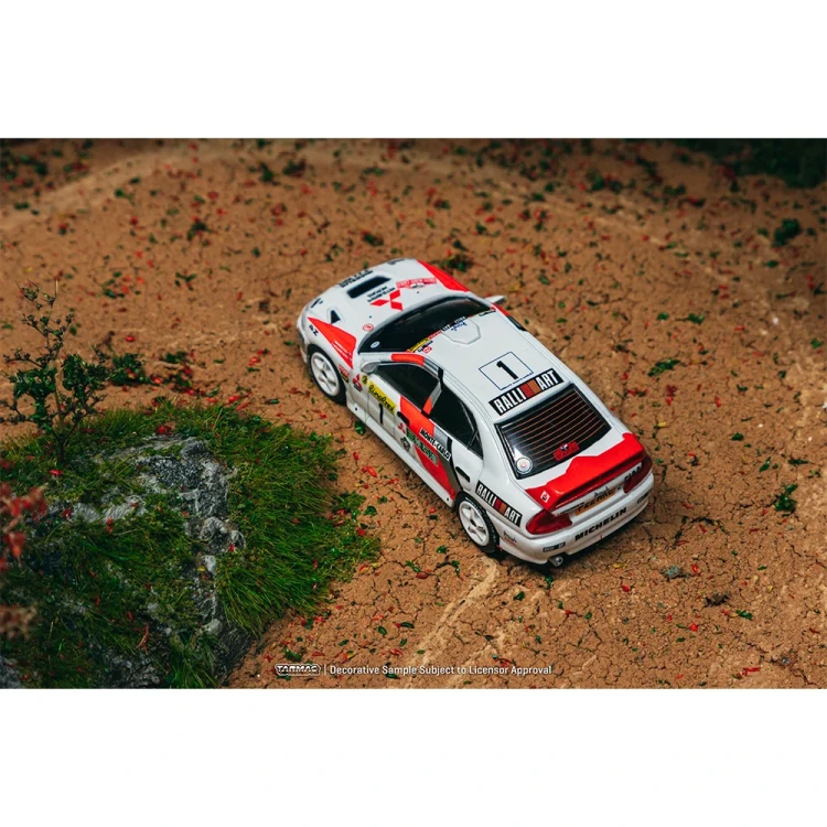 Tarmac Works  Mitsubishi Lancer Evolution IV Rallye Monte-Carlo 1:64 box scena góra