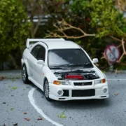 Motorhelix Mitsubishi Lancer Evolution VI GSR Scotia White 1:64 przód detal