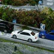 Motorhelix Mitsubishi Lancer Evolution VI GSR Scotia White 1:64 scena