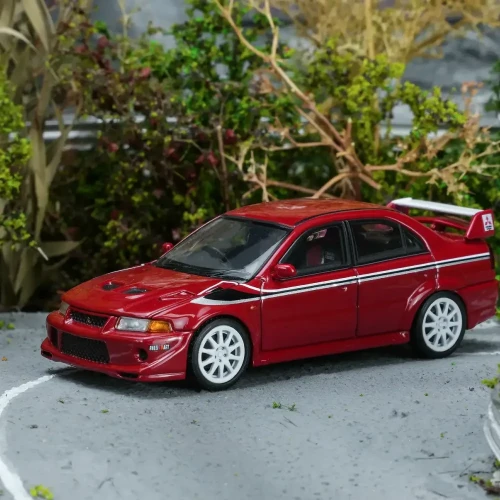 Motorhelix Mitsubishi Lancer Evolution VI GSR T.M.E Passion Red 1:64 przód