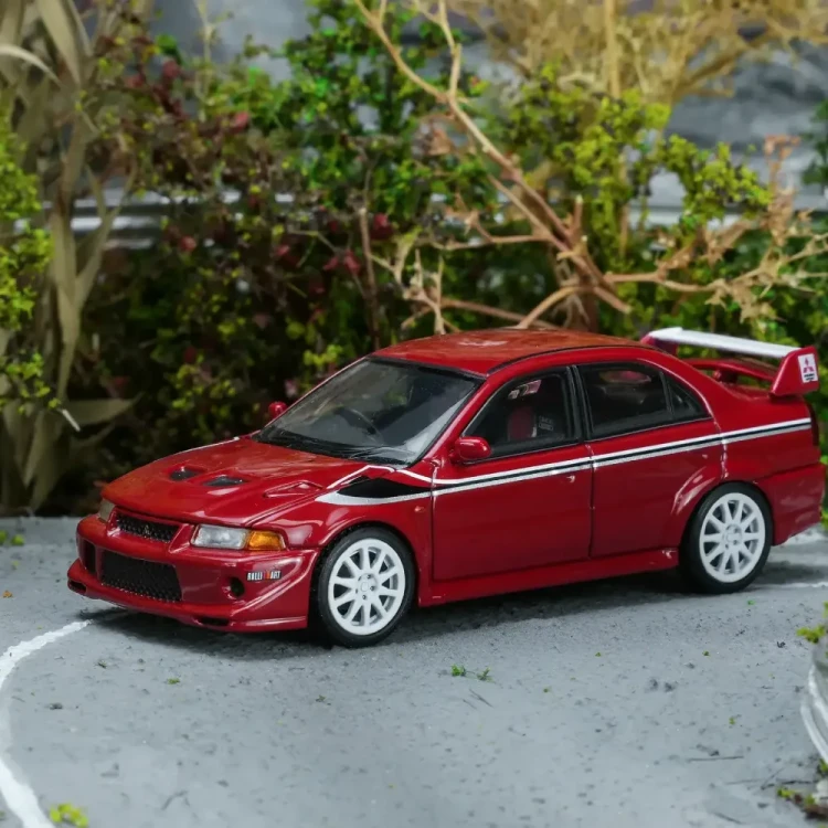 Motorhelix Mitsubishi Lancer Evolution VI GSR T.M.E Passion Red 1:64 przód