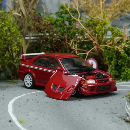 Motorhelix Mitsubishi Lancer Evolution VI GSR T.M.E Passion Red 1:64 przód detal