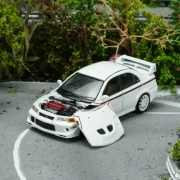 Motorhelix Mitsubishi Lancer Evolution VI GSR T.M.E Scotia White 1:64 przód detal