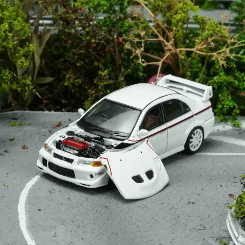 Motorhelix Mitsubishi Lancer Evolution VI GSR T.M.E Scotia White 1:64 przód detal