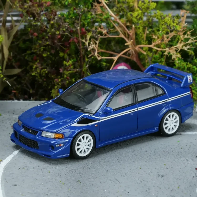 Motorhelix Mitsubishi Lancer Evolution VI GSR T.M.E Issel Blue Pearl 1:64 przód