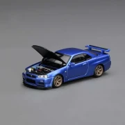 Motorhelix Nissan Skyline GT-R R34 V-Spec II Customized Bayside Blue 1:64 przód detal