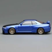 Motorhelix Nissan Skyline GT-R R34 V-Spec II Customized Bayside Blue 1:64 bok