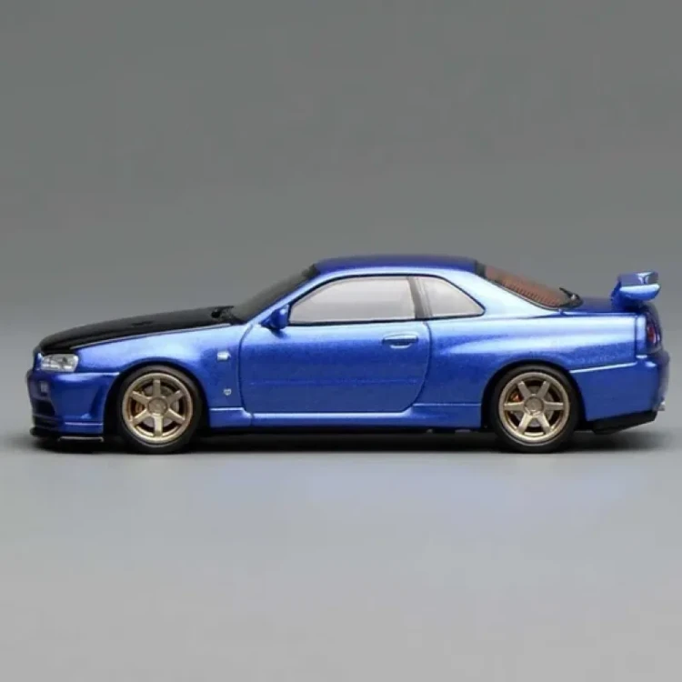 Motorhelix Nissan Skyline GT-R R34 V-Spec II Customized Bayside Blue 1:64 bok
