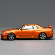 Motorhelix Nissan Skyline GT-R R34 V-Spec II Customized Metallic Orange 1:64 bok