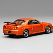 Motorhelix Nissan Skyline GT-R R34 V-Spec II Customized Metallic Orange 1:64 tył