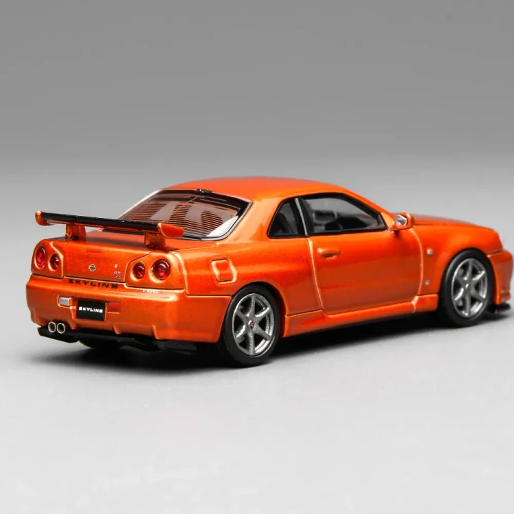 Motorhelix Nissan Skyline GT-R R34 V-Spec II Customized Metallic Orange 1:64 tył