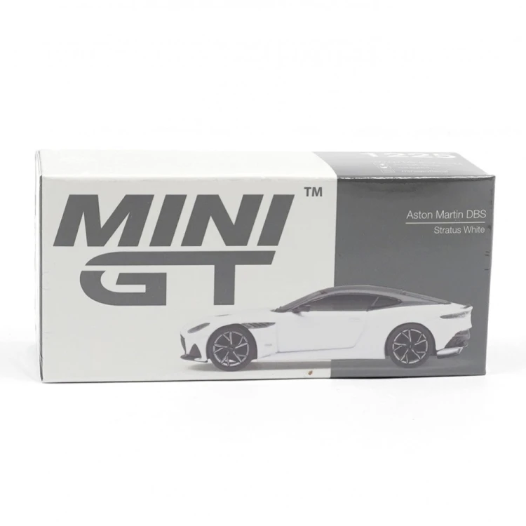 MINI GT Aston Martin DBS Stratus White 1:64 kartonik