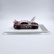 CoolArt Models Nissan Skyline GT-R R34 Gran Turismo + figurka 1:64 bok