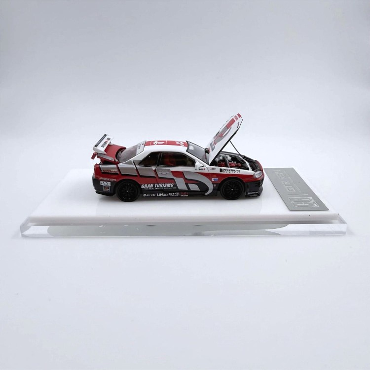 CoolArt Models Nissan Skyline GT-R R34 Gran Turismo + figurka 1:64 bok
